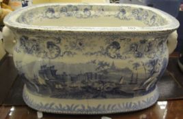 A Victorian blue and white transfer decorated rounded rectangular footbath of bombé form decorated