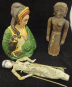 An Indian carved wooden and articulated female doll figure,