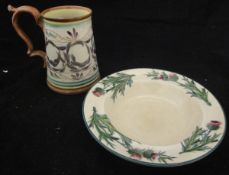 A Wemyss ware soup bowl with hand-painted thistle decoration and an Aldermaston pottery scrolling