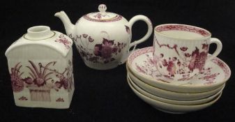 A Meissen part tea service with puce and gilt floral spray decoration on a ribbed body comprising