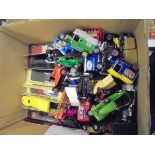 A box of various Models of Yesteryear vehicles including Ford Model A, Ford Model T,