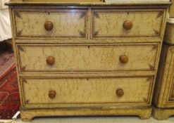 A Victorian chest of two short and two long drawers upon bracket feet,