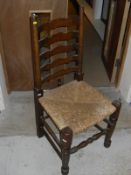 A set of ten oak ladder back rush seated dining chairs CONDITION REPORTS One chair