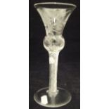 A 19th Century air twist glass of thistle form with engraved decoration of a rose (possibly