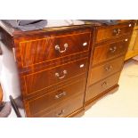 A pair of modern mahogany bedside cabinets, the plain tops above a false door of four drawers,