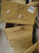 A collection of sixteen wooden wine crates including Château Clerc Milon 1993,