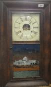 A 19th Century walnut cased American wall clock,