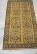An Afghan rug, the ten central elephant foot medallions in pale gold,