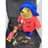 A Pelham puppet, Paddington Bear toy and six various Britain's toy animals including lions, zebra,