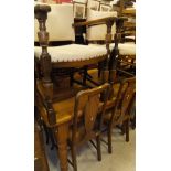 A modern pine rectangular kitchen table, the plain top raised on turned and ringed legs,