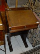 A Victorian pitch pine school desk and a modern beech bent wood hat and coat stand