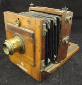 A plate camera with ivorine tag inscribed "E & T Underwood Makers, Birmingham",