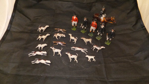 A large collection of Britain's painted hollow cast farm animals, pigs, sheep, chickens,