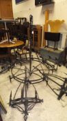 A large wrought iron eight light electrolier in the Victorian Gothic taste,