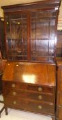 An early 20th Century mahogany bureau bookcase,