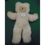 A Merrythought pale pink plush bear with plush snout and pads