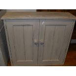 A pine wall hanging two shelf unit together with a cream painted two door wall hanging cupboard and