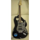 A Fender Squire "Strat" copy electric guitar (SN.