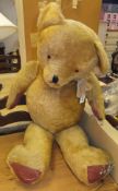 A mid 20th Century gold plush bear in the Fiddeston manner with triangular gold
