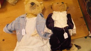 A mid 20th Century gold plush bear with glass eyes and another similar with black button eyes
