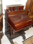 A modern mahogany Davenport desk in the Victorian style with pop up stationery compartment and