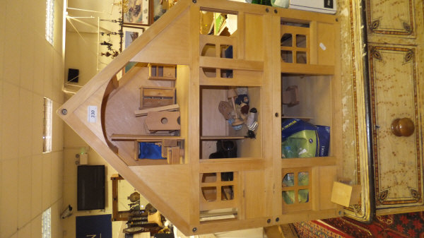 A modern dolls' house, together with various accessories including figures, furniture,