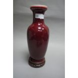 A Chinese ox blood ground rouleau vase with seal mark in blue,