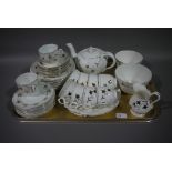 A Staffordshire porcelain part tea service,