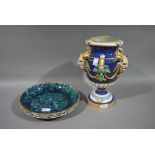 A Minton Majolica Bacchus vase on waisted soccle;