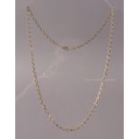 A neck chain in 9ct gold faceted belcher links, approximate length 45cm,