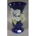 A Moorcroft blue ground floral vase
