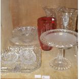 A small quantity of cut and pressed glass including three flower vases, one overlaid in cranberry,