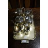 A composite Hotel plate tea service comprising two teapots, coffee pot, hot water jug,