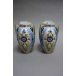 A pair of Noritake ovoid vases, decorated with  stylised flowers on a pink,