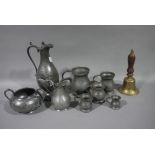 Five Victorian pewter baluster measures, a Britannia metal sugar bowl and milk jug,