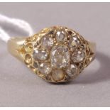 A Victorian diamond cluster ring in 18ct gold,