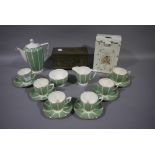 A Minton Solaro ware part coffee service comprising coffee pot and cover, milk jug, six cups,