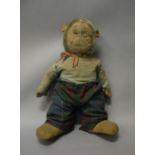 An early 20th century stuffed toy monkey, the silver plush head with composition moulded face,