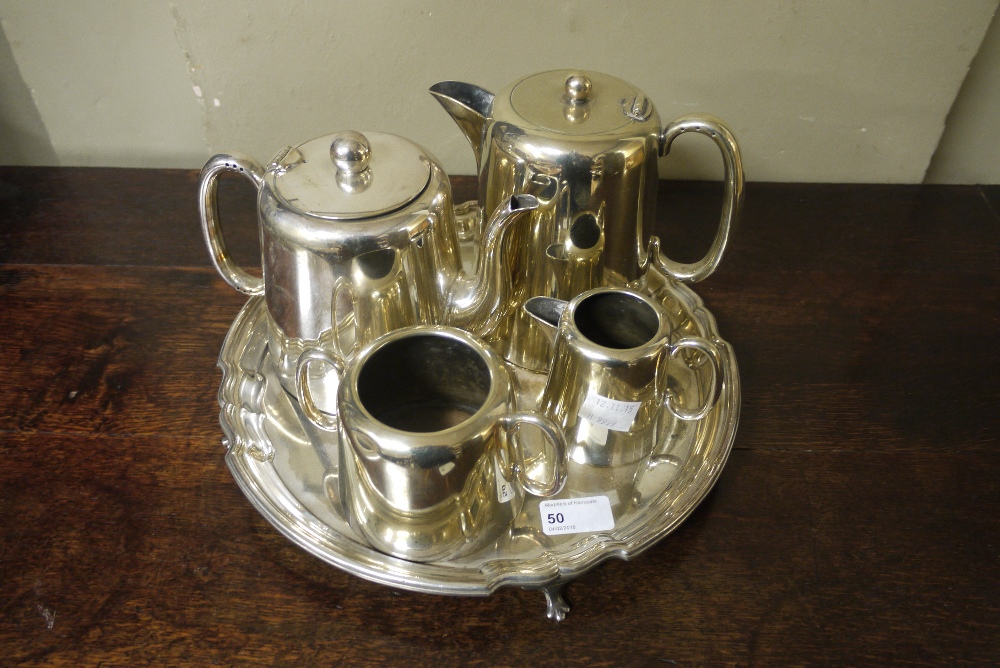 A hotel plate four piece electroplate tea service and electroplate tray