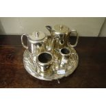 A hotel plate four piece electroplate tea service and electroplate tray