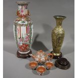 A Cantonese vase decorated in the famille rose colours,