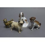 A Royal Worcester figure of a springer spaniel, a Beswick model of a pug,