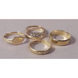 Five rings all in 9ct gold including a five stone spiral set dress ring,