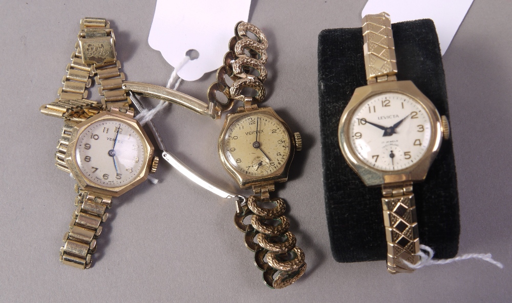 Three lady's wristwatches all c1955 and in 9ct gold cases with later rolled gold bracelets by