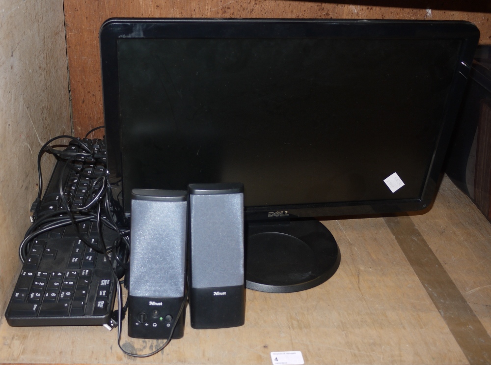 A Dell computer monitor, two Trust speakers,