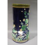 A George Jones Majolica stick stand, moulded with flowers and fishes, of cylindrical form,