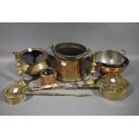 A brassware chestnut roaster and another; a pair of brass candlesticks, an Eastern brass bowl,
