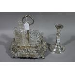 A Victorian silver plated breakfast cruet and six associated glass bottles,