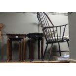 An Ercol stained beech Windsor style chair with loose cushion,