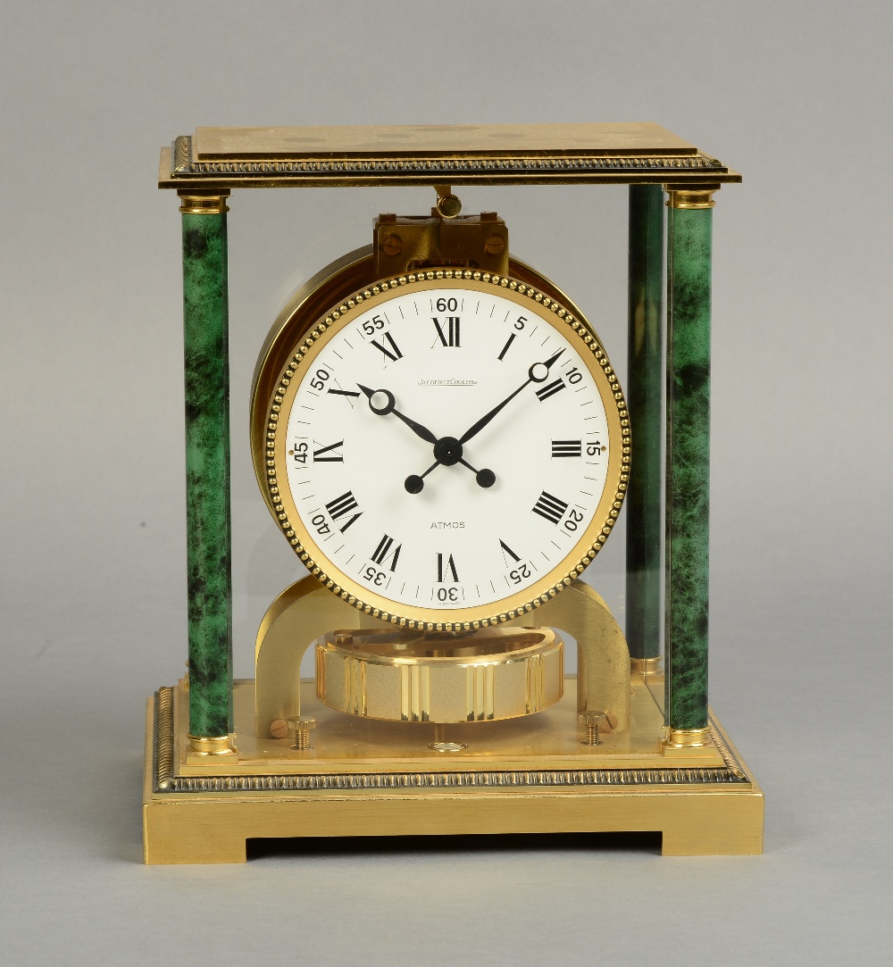 A JAEGER-LE-COULTRE ATMOS CLOCK, with circular white enamel dial,